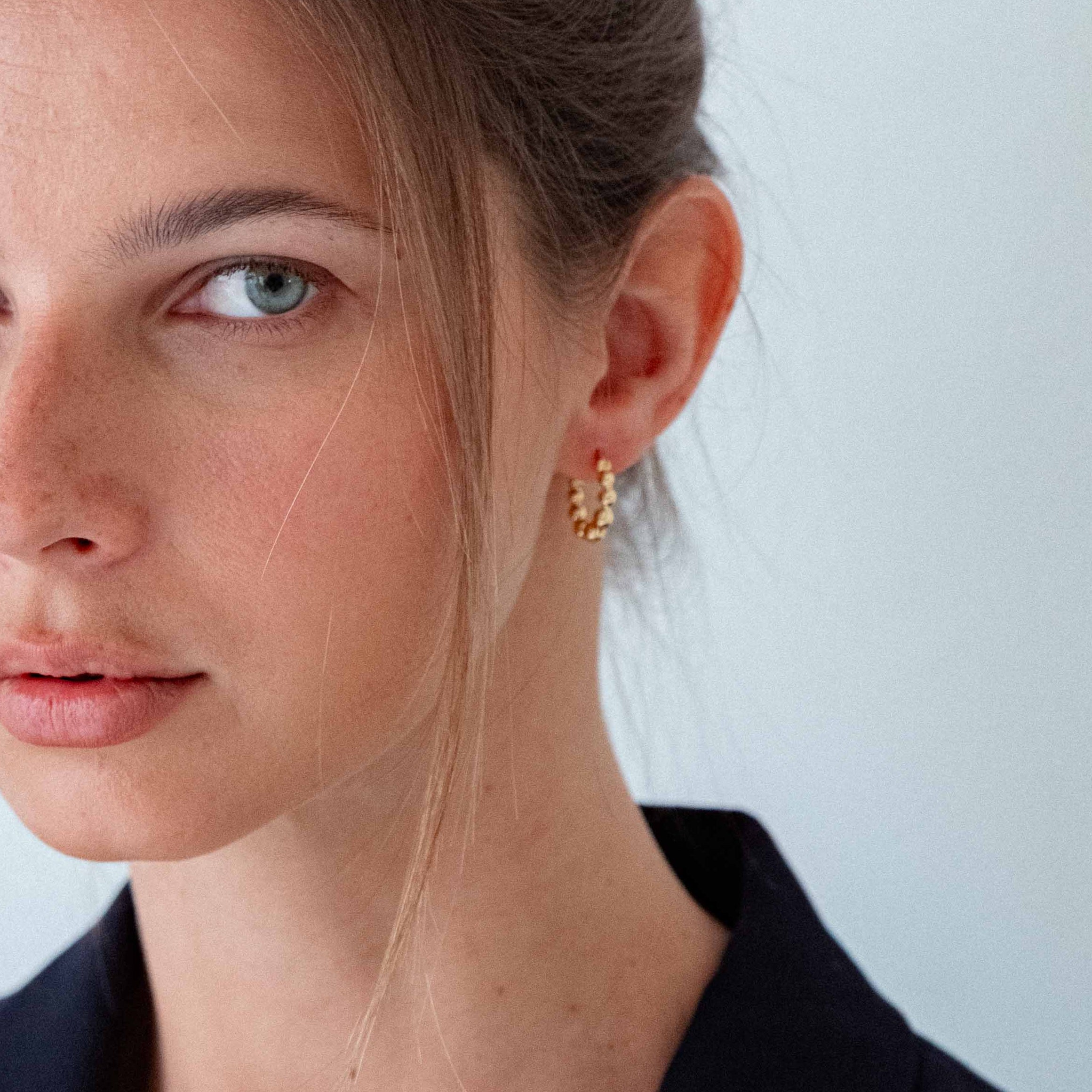 18k gold-plated huggie earrings for everyday wear, minimalist gold huggie earrings with round accents, premium Bali jewelry-style gold plated huggie earrings