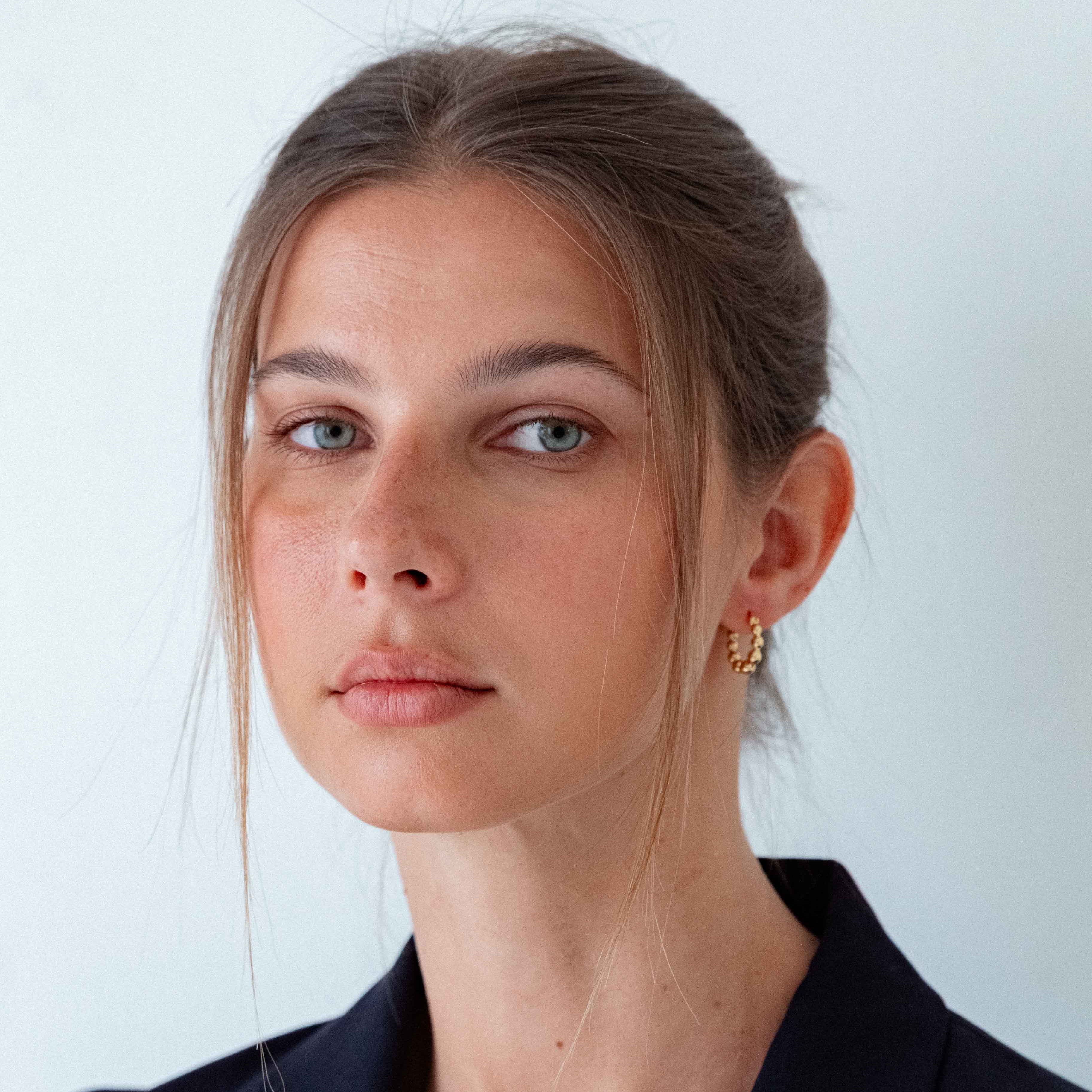 18k gold-plated huggie earrings for everyday wear, minimalist gold huggie earrings with round accents, premium Bali jewelry-style gold plated huggie earrings