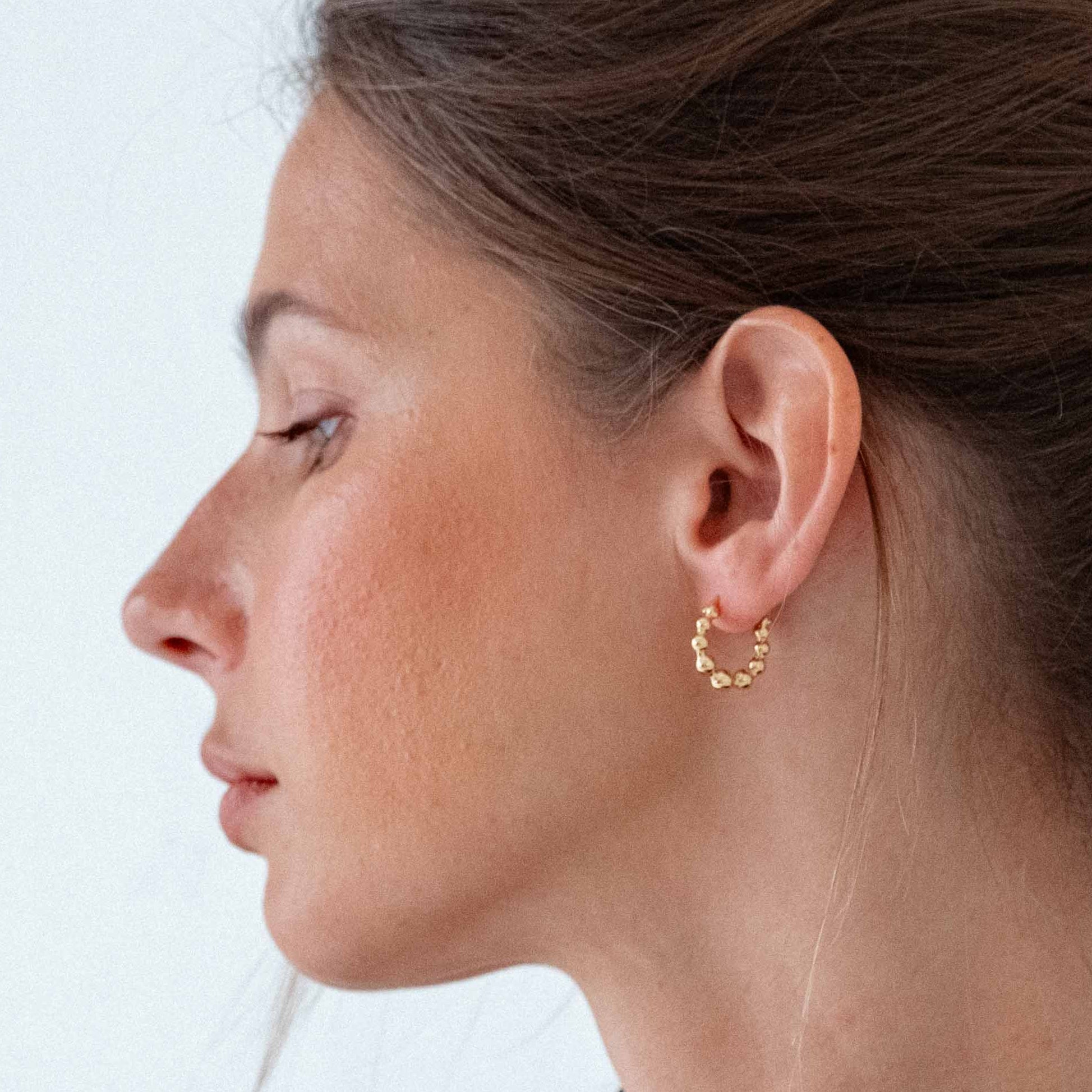 18k gold-plated huggie earrings for everyday wear, minimalist gold huggie earrings with round accents, premium Bali jewelry-style gold plated huggie earrings