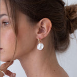unique and high-quality pearl earrings for feminine looks, affordable pearl jewelry in Bali for your active days