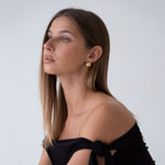 Minimalist gold-plated earrings in Bali