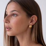 Minimalist gold-plated earrings in Bali