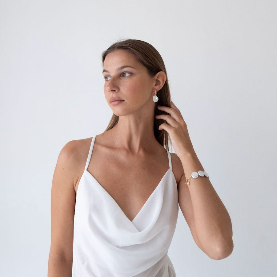 unique and high-quality pearl earrings for feminine looks, affordable pearl jewelry in Bali for your active days