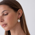 unique and high-quality pearl earrings for feminine looks, affordable pearl jewelry in Bali for your active days